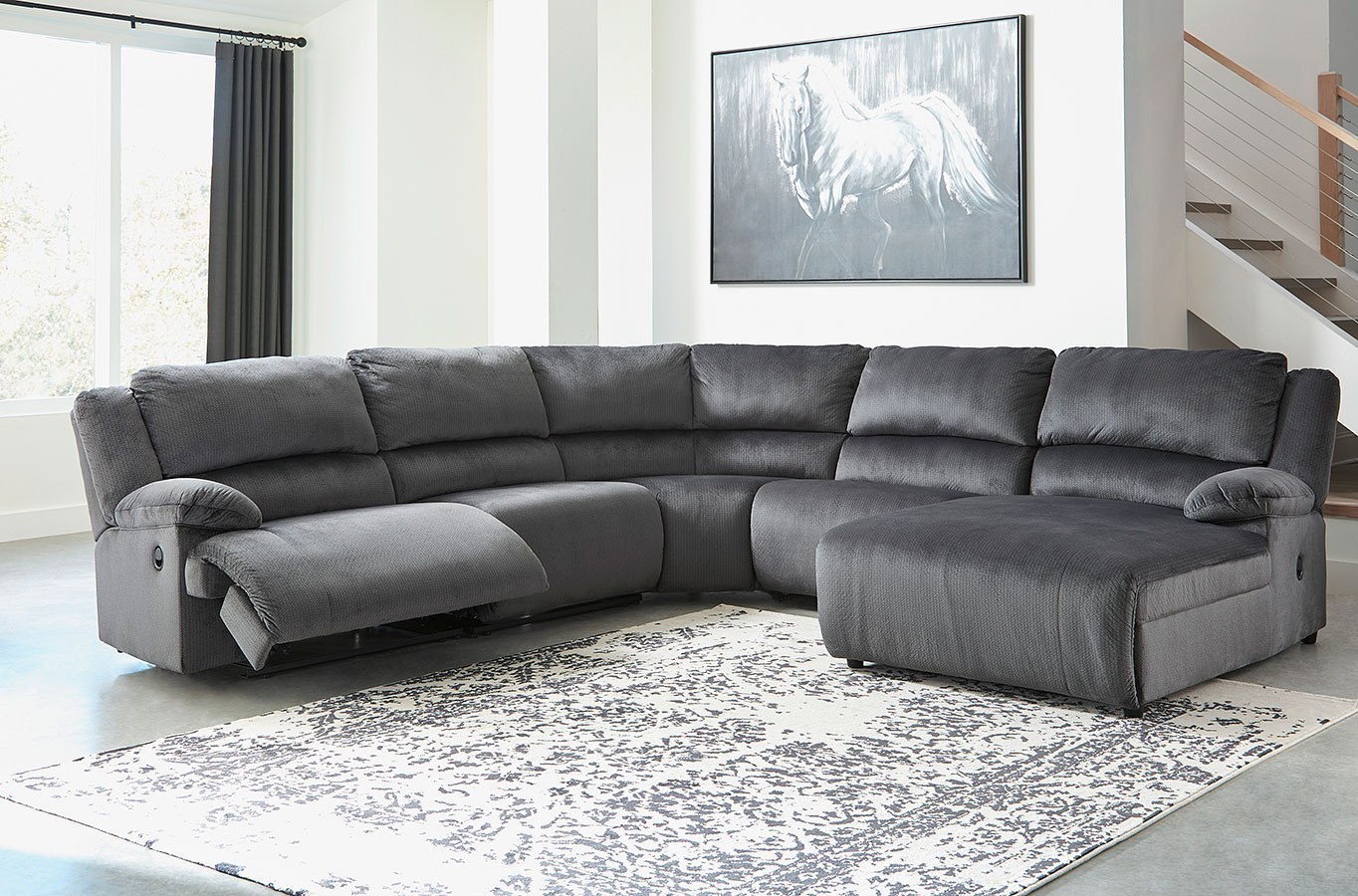 Clonmel Charcoal Modular Reclining Sectional By Signature Design By 