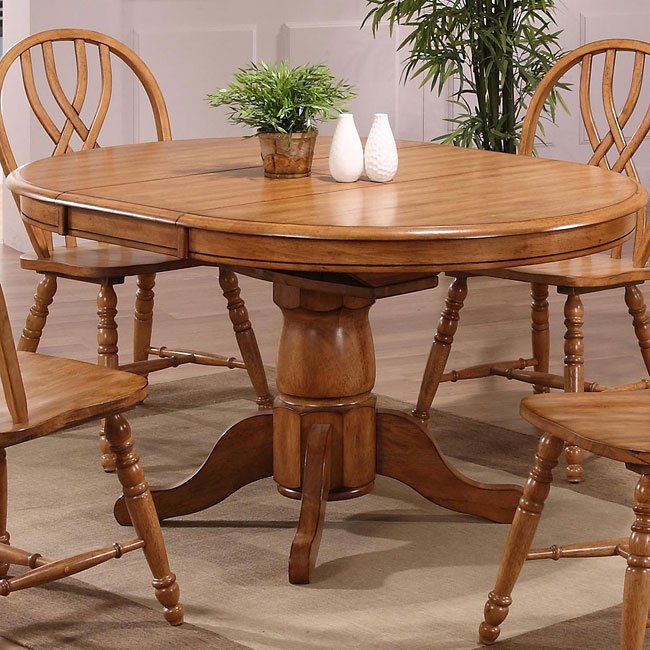 round oak table with leaf and 4 chairs